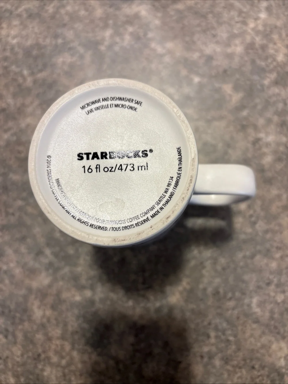Starbucks White Mug with Black Siren Logo and Red Star Pattern